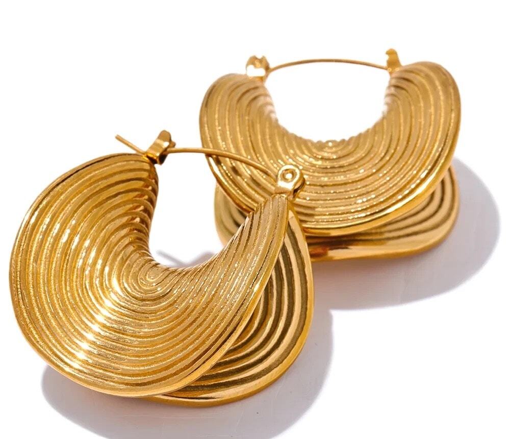 Anthropologie gold twisted gold bohemian hoop earrings statement